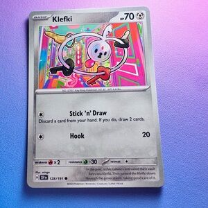 klefki - 128/191 (common) — pokemon: surging sparks